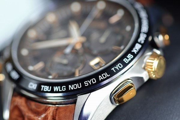 stock-photo-close-up-shallow-focus-time-zone-cities-code-on-luxury-world-time-watch-bezel-syd-sydney-adl-1902082909_1.jpg